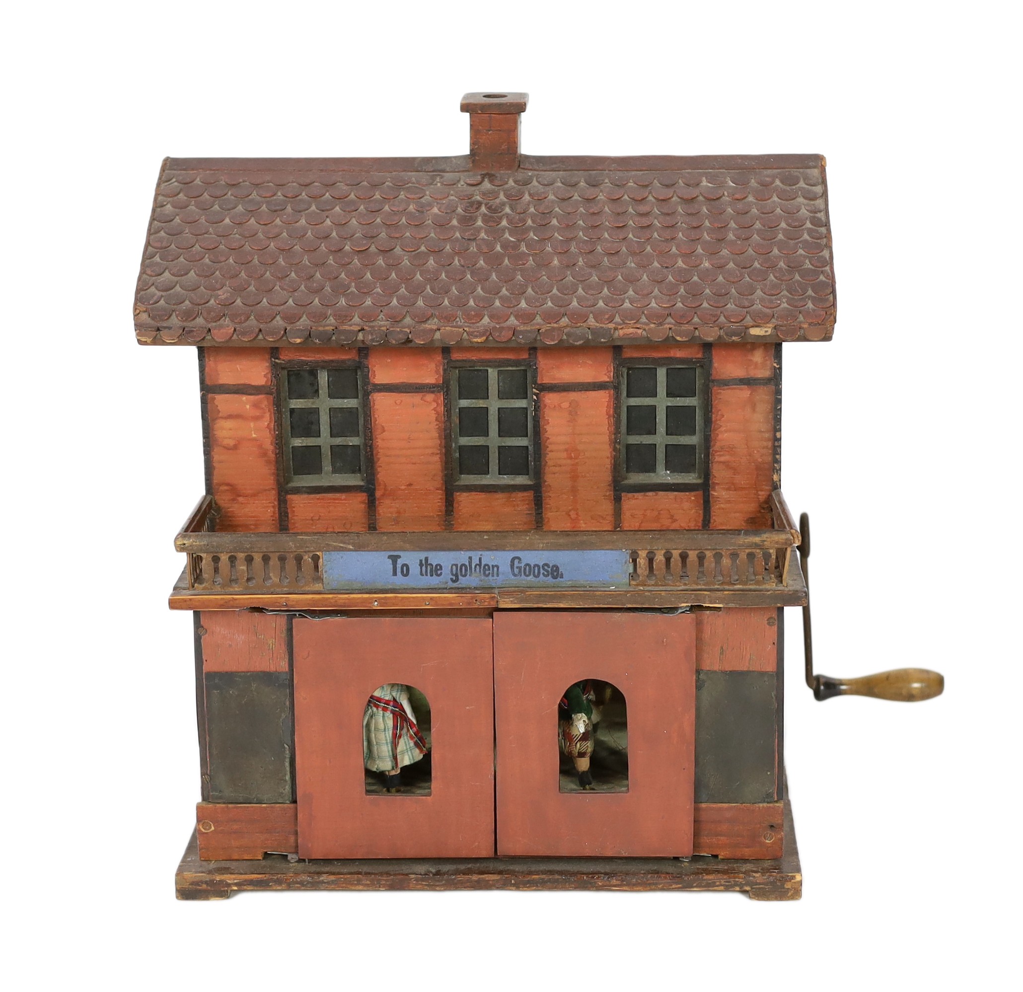 ‘To The Golden Goose’: A rare German musical toy modelled as two storey half-timbered building, circa 1890, 39cm high